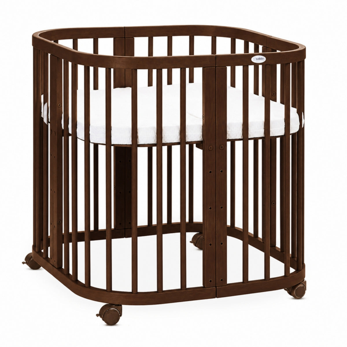 Quadi 7in1 Babybett Walnut als kleines Babybett mit Rollen